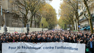 Tens of thousands march in Paris against anti-Semitism