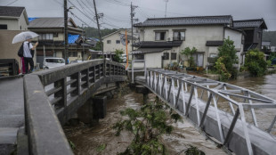 Floods, landslides hit central Japan months after major quake