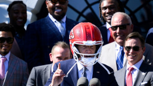 Helmet-wearing Biden aims to emulate back-to-back Super Bowl champs