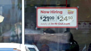 US unemployment ticks down as job market remains robust