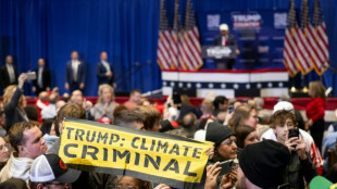 Climate protesters interrupt Trump event in Iowa