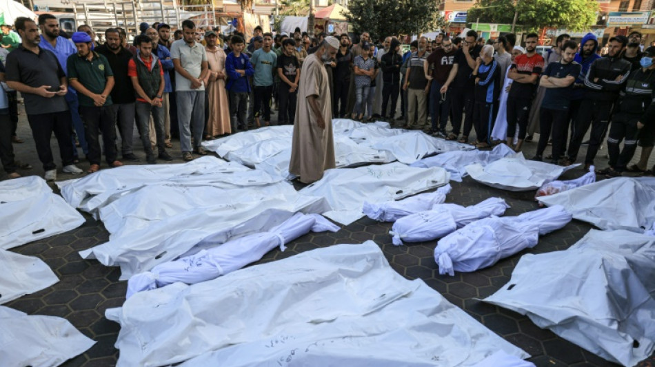 Gazans bury their dead in orchards and football fields