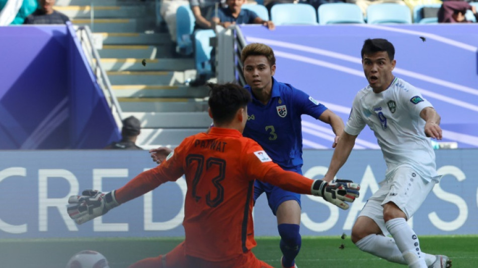 Uzbekistan break down Thailand to reach Asian Cup last eight