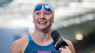 Haughey wins 100m free in US Open meet record