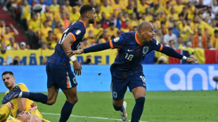 Malen doubles up as Dutch beat Romania to reach Euro 2024 quarters