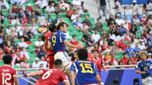 Japan into Asian Cup last 16 as Iraq win five-goal thriller