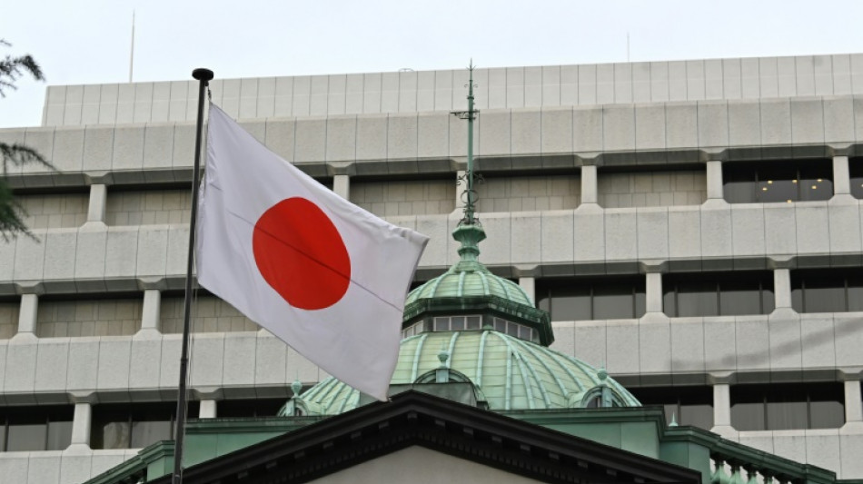 Yen drops, Asian markets mixed as Japan hikes interest rates