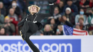 Malinin nails six quadruple jumps to win men's figure skating world title