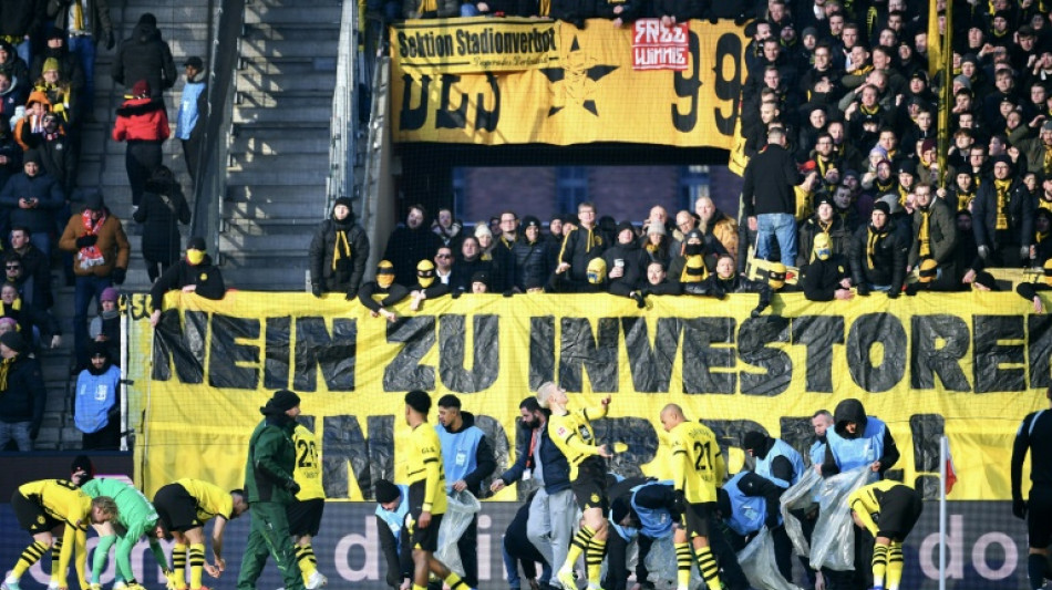 Fan protests interrupt Cologne-Dortmund game