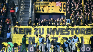 Fan protests interrupt Cologne-Dortmund game