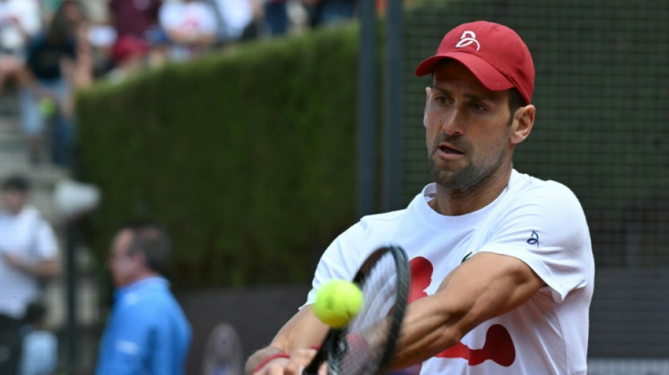 'Fine' Djokovic dons cycling crash helmet after Rome bottle drama