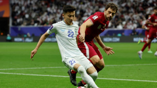 Qatar beat Uzbekistan on penalties to reach Asian Cup semis