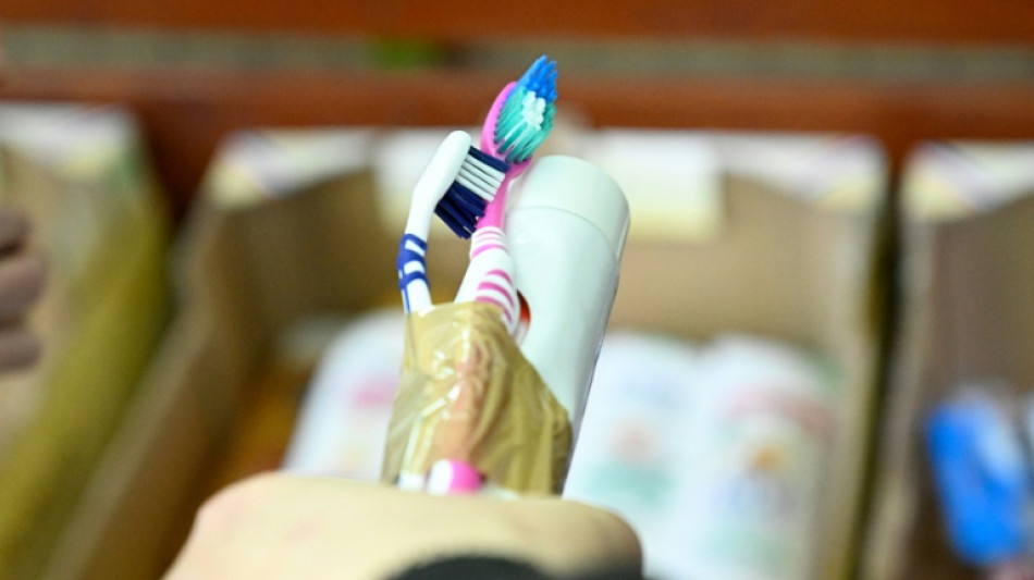 Children get tooth brushing lessons as UK battles dental care crisis