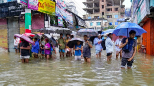 Floods swamp Bangladesh as nation finds its feet after protests