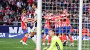 Relentless Atletico claim Liga lead with win over Osasuna