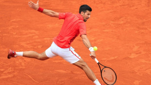 Djokovic cruises in Monte Carlo after Alcaraz withdraws injured