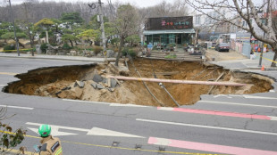 Motorcyclist killed by giant Seoul sinkhole