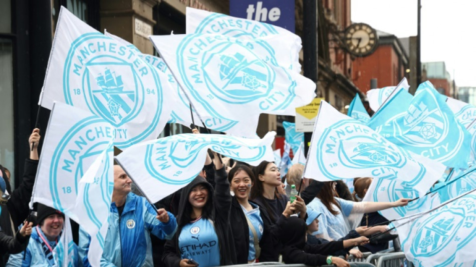 Guardiola vows FA Cup revenge as Man City celebrate title triumph