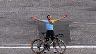 Evenepoel wins road race for historic Olympic cycling double