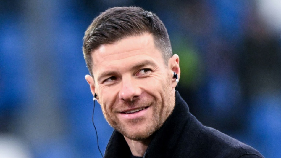 Liverpool target Xabi Alonso says staying as Leverkusen coach