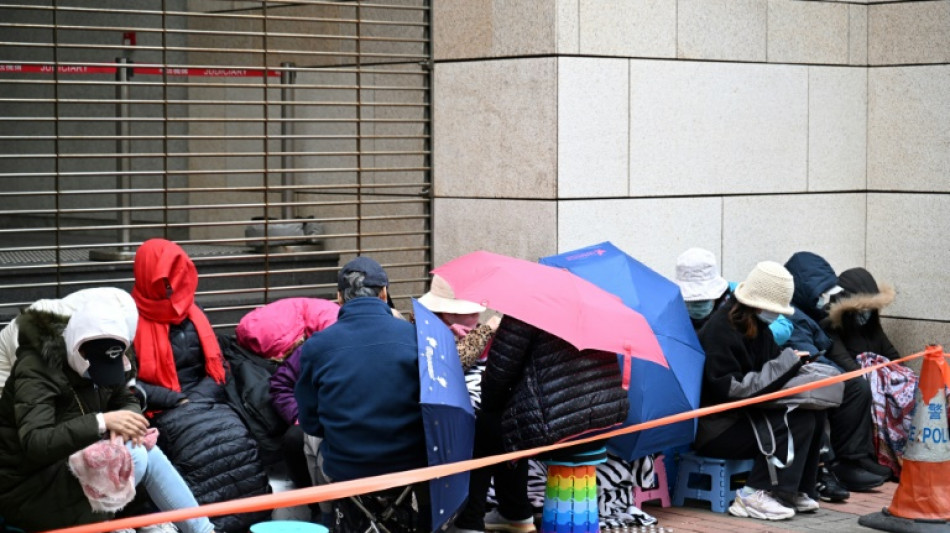 Supporters of Hong Kong pro-democracy 'hero' Jimmy Lai wait in cold for trial