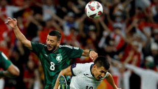 Saudi Arabia beat nine-man Kyrgyzstan to reach Asian Cup last 16