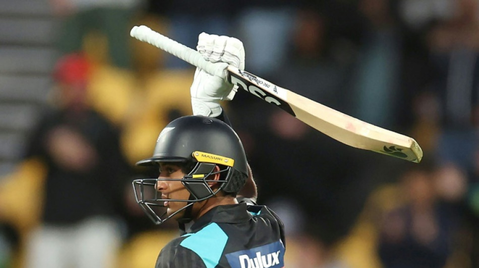 Ravindra punishes Australia as New Zealand post 215-3 in first T20