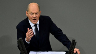 Germany's embattled Scholz trades blows with rivals as election looms