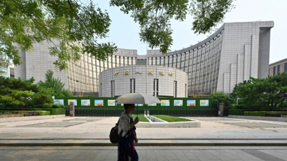 China central bank cuts two key rates to support flagging economy