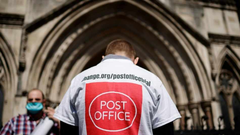 UK Post Office chief sacked as firm reels from IT scandal 