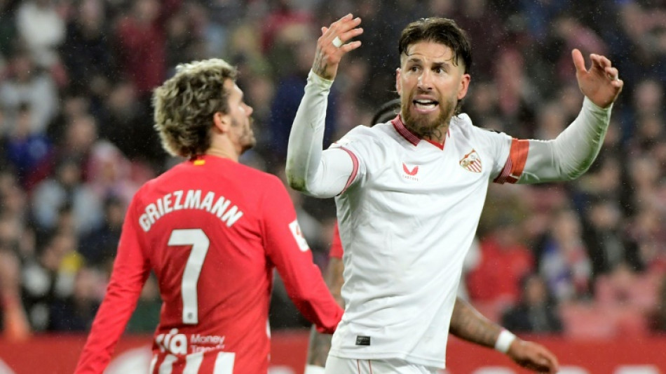 Lowly Sevilla deal Atletico blow in Liga title race