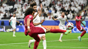 Hosts Qatar into Asian Cup last 16 but China made to sweat