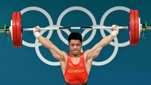 China's Li retains gold as Olympic weightlifting starts