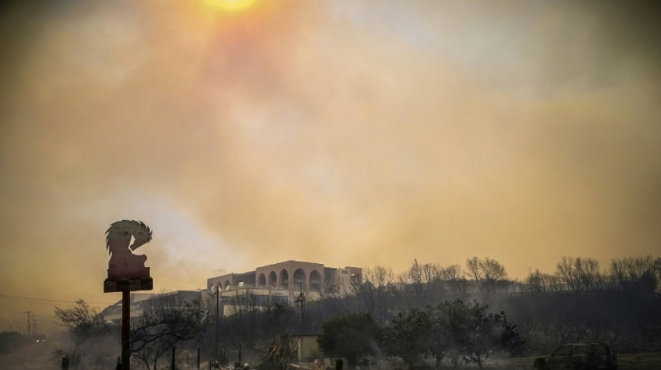 Thousands moved to safety as wildfires rage on Greek island of Rhodes