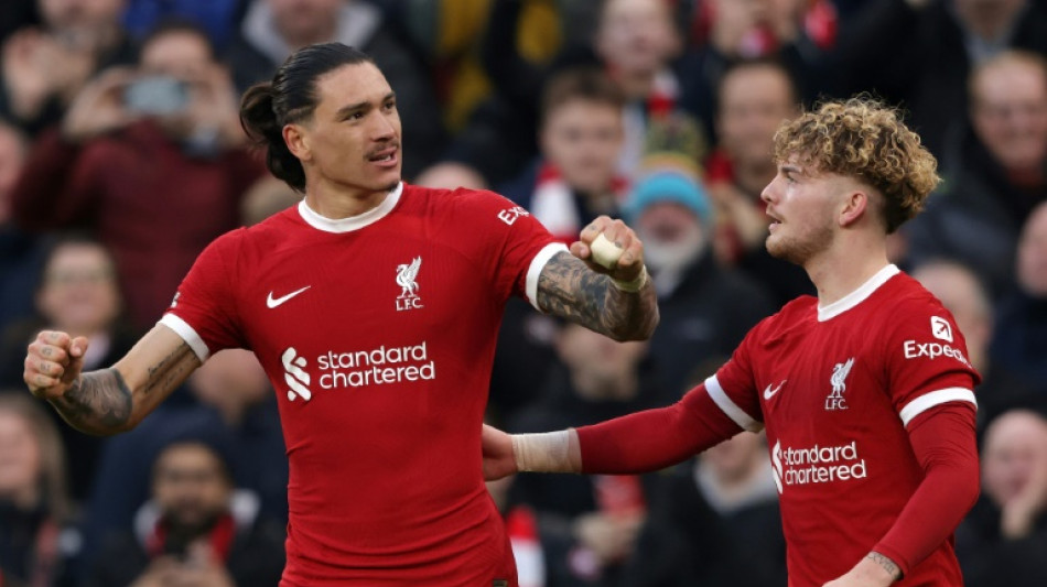 Liverpool survive Burnley scare to regain top spot