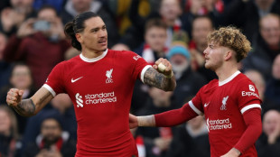 Liverpool survive Burnley scare to regain top spot