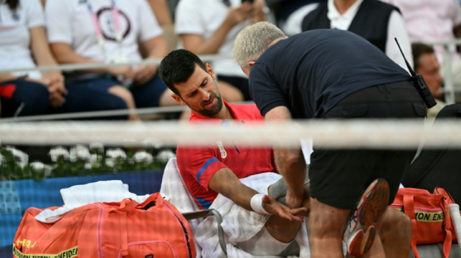 Djokovic survives injury scare to reach Olympics semi-finals