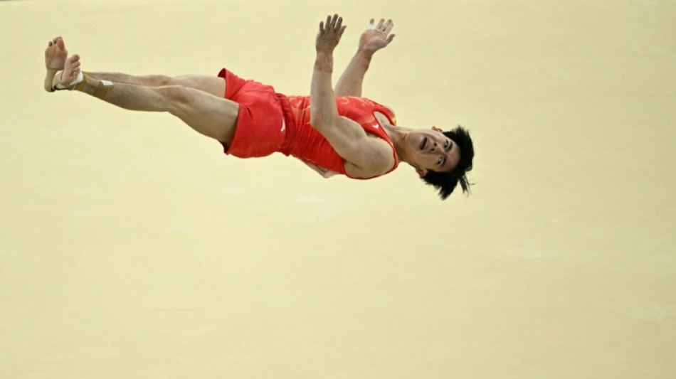 China shade Japan as Olympic gymnastics springs into action