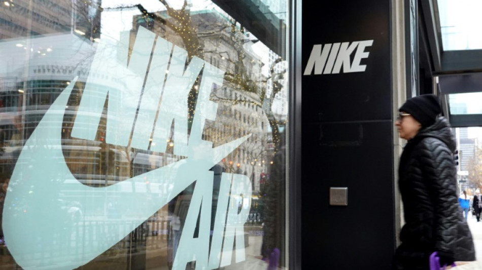 Nike shares tumble as it cut costs amid 'softer' outlook