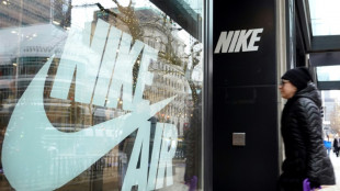 Nike shares tumble as it cuts costs amid 'softer' outlook