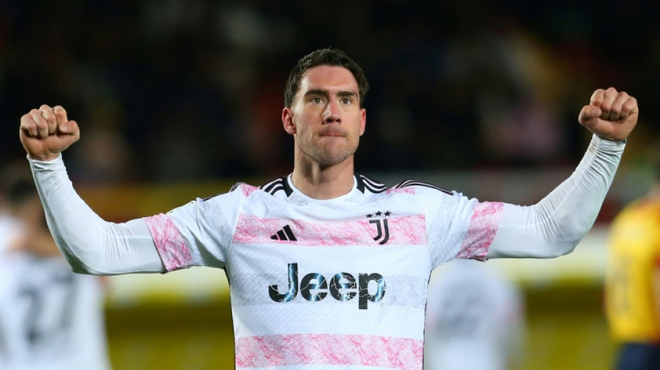 Vlahovic double lifts Juventus to top of Serie A