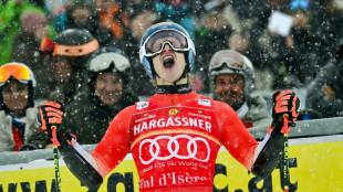 Dominant Odermatt wins giant slalom opener in Val d'Isere