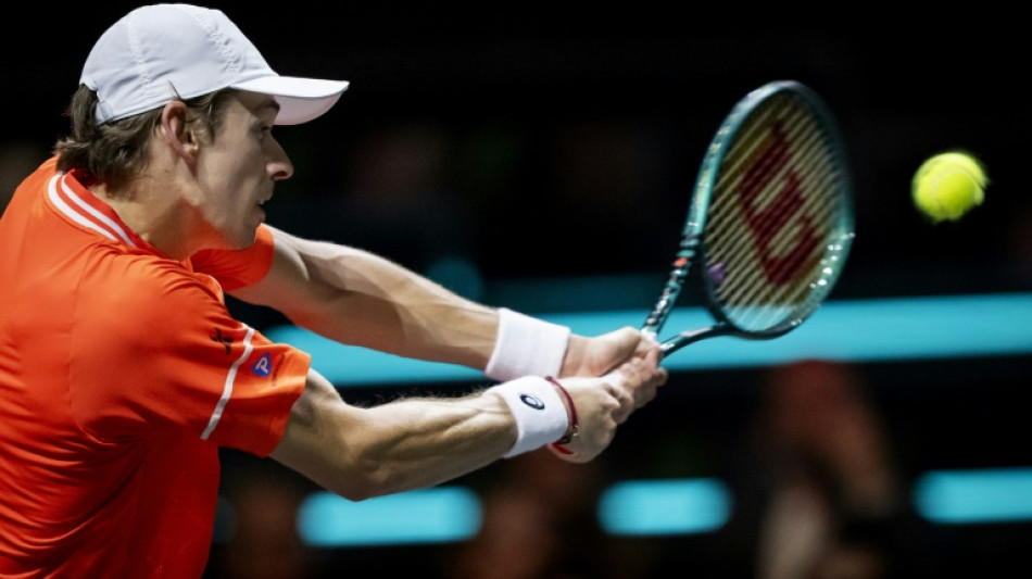 Birthday-boy De Minaur celebrates with Rotterdam semis win