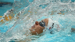 McKeown goes close to 100m backstroke world record in Sydney 