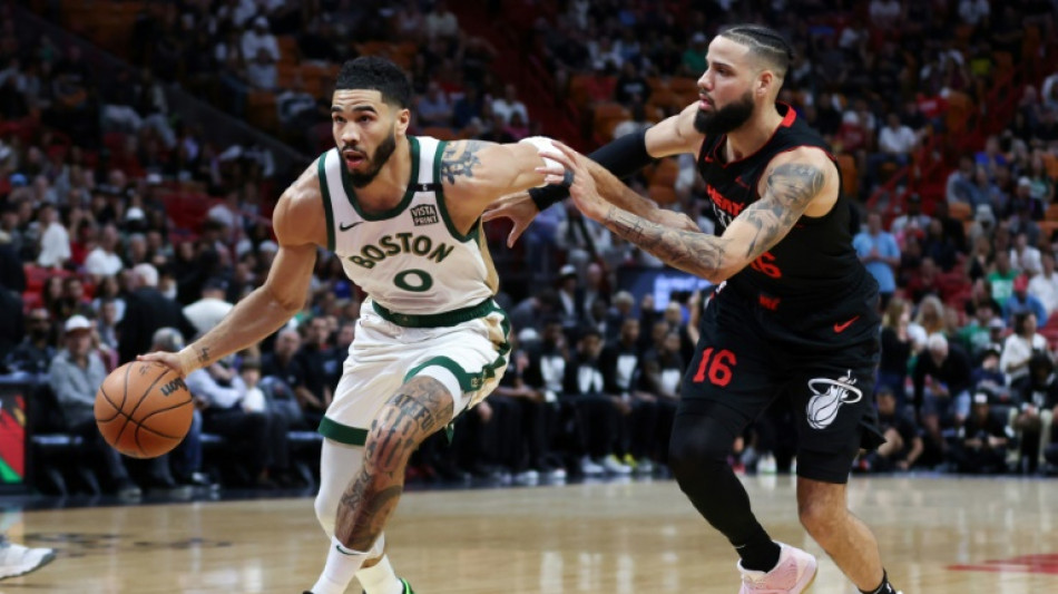 Celtics hold off Heat in bruising NBA clash