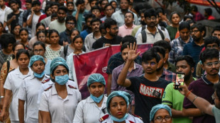 Thousands march, doctors plan new strike over colleague's brutal murder