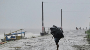 Cyclone hits Bangladesh as nearly a million flee inland for shelter