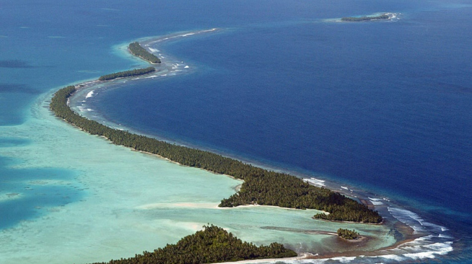 'We felt it first': Climate-threatened islands battle fossil fuels at COP28 