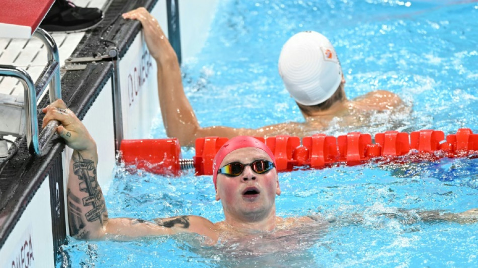 Peaty denied third straight Olympic breaststroke gold, Marchand triumphs