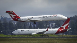 Profits decline as Qantas looks to win back angry customers